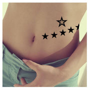 Tatouage éphémère temporaire étoiles féeriques noir